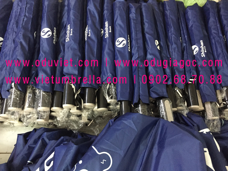 xưởng sản xuất ô dù cầm tay in logo quảng cáo